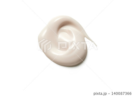 Cosmetic cream swirl smear isolated on white background 140087366