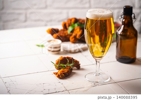 Glass of light beer Glass of light beer 140088395