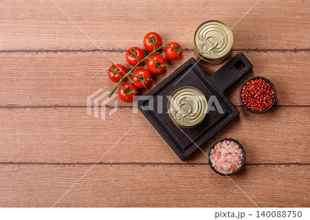 A metal tin can of meat, fish, or dog or cat food. A tin can of food 140088750