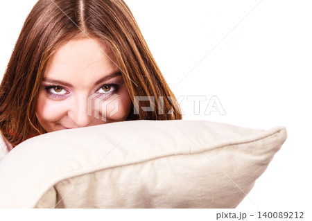 Smiling woman with pillow Smiling woman with pillow 140089212
