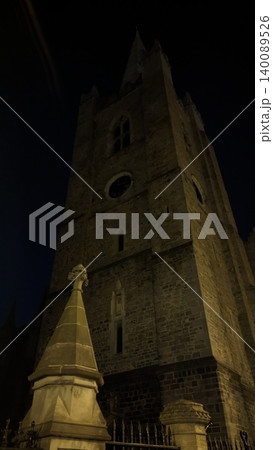 Dublin, Ireland - May 31, 2023: low-angle church tower at night Dublin, Ireland - May 31, 2023: low-angle church tower at night 140089526