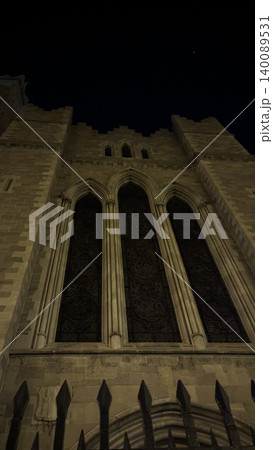 Dublin, Ireland - May 31, 2023: stone church facade with Gothic windows Dublin, Ireland - May 31, 2023: stone church facade with Gothic windows 140089531