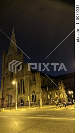 Dublin, Ireland - May 31, 2023: night view of church facade under streetlights Dublin, Ireland - May 31, 2023: night view of church facade under streetlights 140089535