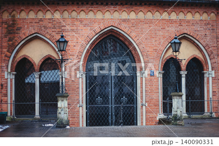 Symmetrical view of a historic red brick building facade Symmetrical view of a historic red brick building facade 140090331