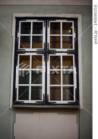 Symmetrical close-up of a traditional four-pane window Symmetrical close-up of a traditional four-pane window 140090358