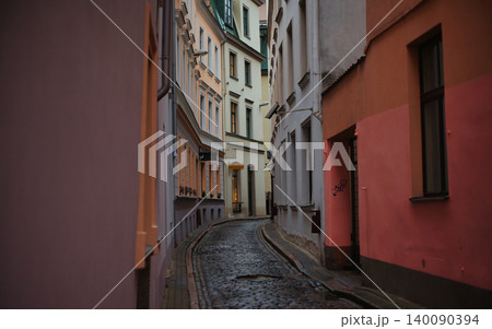 Atmospheric Narrow Cobblestone Street in Old Town  140090394