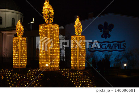 Large Outdoor Christmas Candle Installations Glowing  140090681