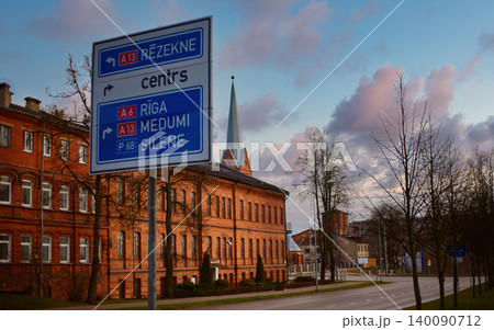 Blue and White Directional Road Sign in an Urban Setting Blue and White Directional Road Sign in an Urban Setting 140090712