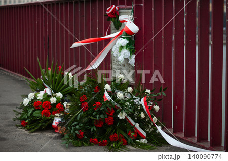 Memorial Flowers and Polish National Ribbons Memorial Flowers and Polish National Ribbons 140090774