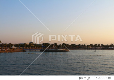 Tranquil Tropical Beach Resort at Sunset Tranquil Tropical Beach Resort at Sunset 140090836