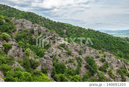 Rocky mountain hills in the Wachau valley with green forests ideal for hiking and outdoor exploration. Rocky mountain hills in the Wachau valley with green forests ideal for hiking and outdoor exploration. 140091203