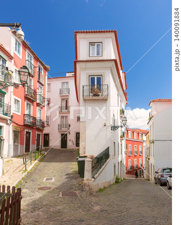 Residential Buildings on Cobblestone Street in Alfama District Lisbon Portugal Residential Buildings on Cobblestone Street in Alfama District Lisbon Portugal 140091884