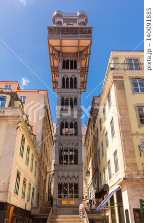 Santa Justa Lift Tower in Lisbon Historic Center Under Clear Summer Sky Santa Justa Lift Tower in Lisbon Historic Center Under Clear Summer Sky 140091885