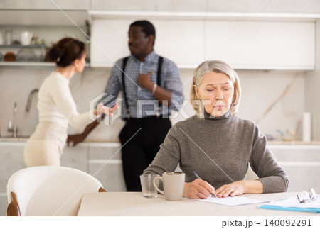 Mature woman relatives tell her who to include in her testament Mature woman relatives tell her who to include in her testament 140092291