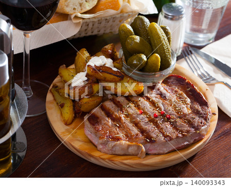 Grilled beef with fried potatoes Grilled beef with fried potatoes 140093343
