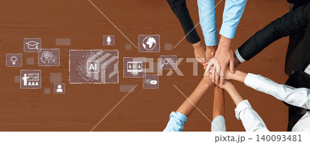 Collaborative Teamwork and Artificial Intelligence Concept on a Brown Desk with Hands Meeting and Digital Icons Illustrating Technology and Innovation. Bitwise Collaborative Teamwork and Artificial Intelligence Concept on a Brown Desk with Hands Meeting and Digital Icons Illustrating Technology and Innovation. Bitwise 140093481