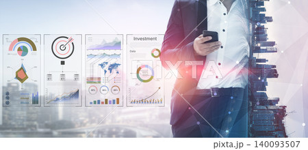 Business Professional Analyzing Financial Data on Smartphone with Graphs and Charts Displayed in Modern Office Environment. Bitwise 140093507