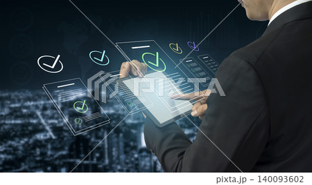 Business Professional Using Digital Tablet for Document Management and Cloud Technology on Abstract Urban Background with Graphic Elements Cyphers. 140093602