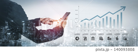 Business Professional Using Mobile Device to Monitor Growth Trends with Financial Data Overlaid on City Skyline in Background Ledger Business Professional Using Mobile Device to Monitor Growth Trends with Financial Data Overlaid on City Skyline in Background Ledger 140093808
