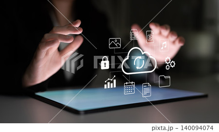 Hands Interacting with Cloud Technology on Tablet Device with Icons Representing Data, Security, and Multimedia Gantry Hands Interacting with Cloud Technology on Tablet Device with Icons Representing Data, Security, and Multimedia Gantry 140094074
