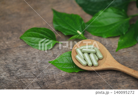 Herbal supplement capsules from Wildbetal Leafbush for use as a medicine in eating Herbal supplement capsules from Wildbetal Leafbush for use as a medicine in eating 140095272