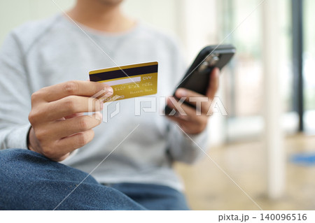 Credit card used for secure online shopping payment and mobile checkout. Credit card used for secure online shopping payment and mobile checkout. 140096516