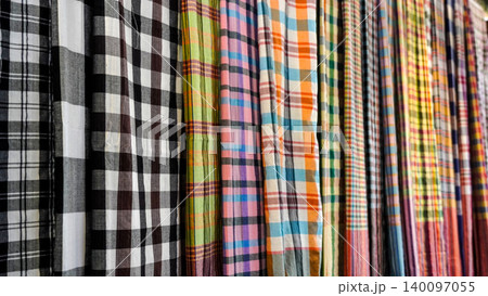Colorful Thai loincloths with traditional checkered patterns Colorful Thai loincloths with traditional checkered patterns 140097055