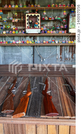 Vintage shooting gallery game at a traditional festival Vintage shooting gallery game at a traditional festival 140097056