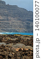 Wide view of Lanzarote desert landscape with volcanic hills and stark island beauty 140100077