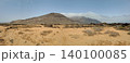 Wide view of Lanzarote desert landscape with volcanic hills and stark island beauty 140100085