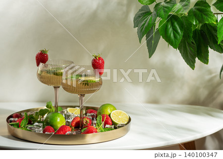 Refreshing strawberry lime mojito cocktails for summer party 140100347