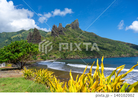 Hatiheu Bay and Beach, Nuku Hiva, French Polynesia, with lush cliffs 140102002