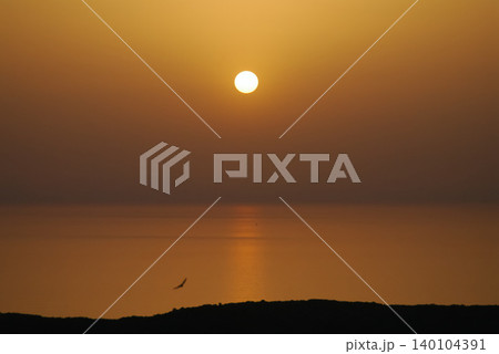 sunset over the sea 140104391