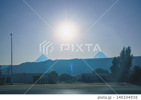 Sunrise View of the Pyramids of Giza in Cairo Egypt Sunrise View of the Pyramids of Giza in Cairo Egypt 140104938