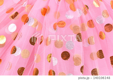Pink tulle fabric with golden and silver polka dots Pink tulle fabric with golden and silver polka dots 140106148