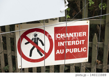 French warning sign 'chantier interdit au public' which translates as 'Do not enter construction site' French warning sign 'chantier interdit au public' which translates as 'Do not enter construction site' 140111089