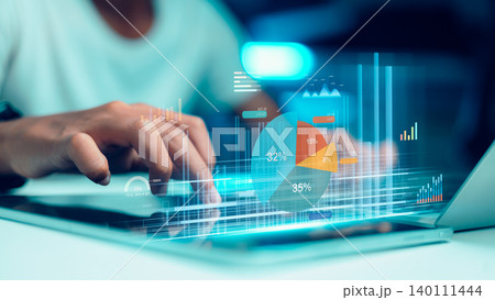 Professional businessman analyzing financial data hologram on laptop with 3D pie charts and graphs. Concept of digital investment, stock market growth, and futuristic big data technology. Professional businessman analyzing financial data hologram on laptop with 3D pie charts and graphs. Concept of digital investment, stock market growth, and futuristic big data technology. 140111444