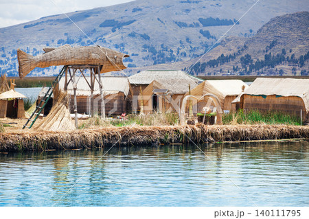 Totora boat on the Titicaca lake near Puno, Peru Totora boat on the Titicaca lake near Puno, Peru 140111795