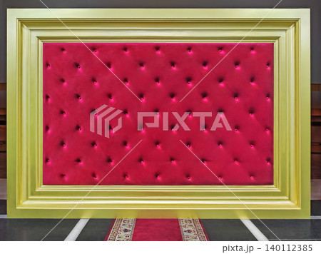 Photo zone with golden frame and red carpet Photo zone with golden frame and red carpet 140112385