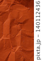 Orange crumpled paper texture abstract vertical background 140112436
