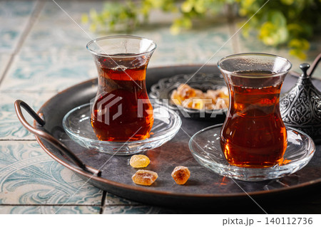 Turkish tea in traditional glass Turkish tea in traditional glass 140112736