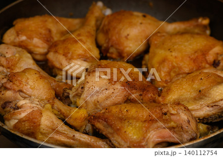 Fried Chicken Drumsticks and Thighs in Pan Fried Chicken Drumsticks and Thighs in Pan 140112754