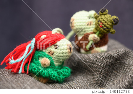 Two Handmade Crochet Amigurumi Capybara Toys Close-Up Two Handmade Crochet Amigurumi Capybara Toys Close-Up 140112758