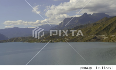 Expansive Lake Vista With Distant Mountains, Breathtaking Aerial View Of Tranquil Lake And Surrounding Peaks. Creative 140112851