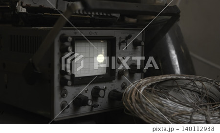 Laboratory Setup With Glowing Signal Trace. Close View Of Testing Instruments With Copper Spool Detail . Media Laboratory Setup With Glowing Signal Trace. Close View Of Testing Instruments With Copper Spool Detail . Media 140112938