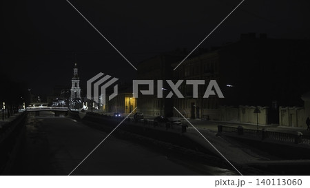 Night City Scene. Serene Winter Night View Showcasing Quiet City With Snowcovered Banks And Dim Lamplight. Media Night City Scene. Serene Winter Night View Showcasing Quiet City With Snowcovered Banks And Dim Lamplight. Media 140113060