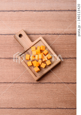 Hard yellow cheddar cheese for sandwiches or pasta. Cheddar cheese 140113420