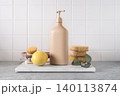 Eco cleaning composition with tools and lemon on white tiles 140113874