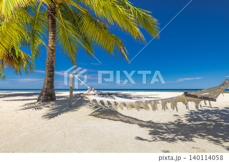 Stunning tropical beach palm trees woven hammock white sand loungers turquoise lagoon breathtaking serene idyllic paradise coastal escape dreamy relaxation getaway summer carefree shoreline sunny Stunning tropical beach palm trees woven hammock white sand loungers turquoise lagoon breathtaking serene idyllic paradise coastal escape dreamy relaxation getaway summer carefree shoreline sunny 140114058