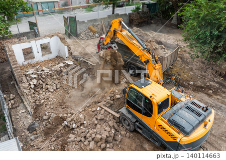 Aerial View of Demolition Site with Excavators and Dump Truck Aerial View of Demolition Site with Excavators and Dump Truck 140114663
